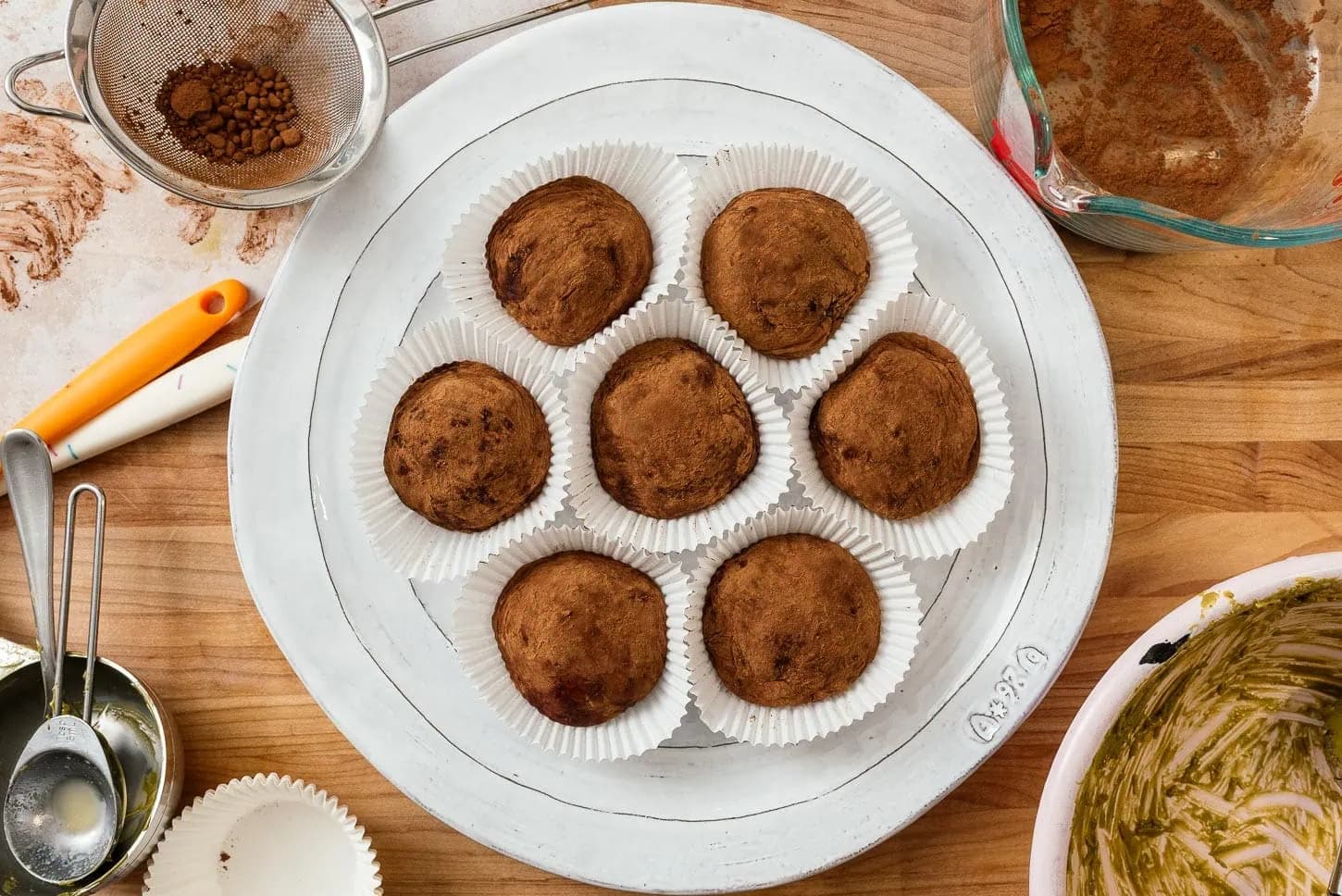 Overhead view of freshly baked dubai chocolate cookies on a platter